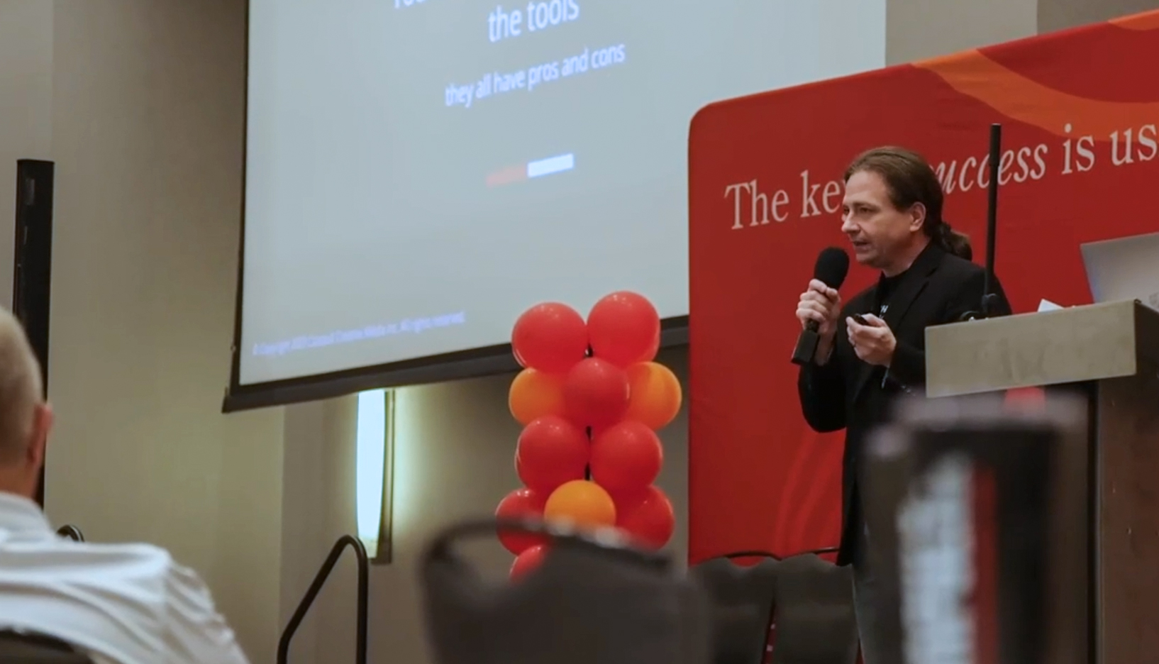 David Maples delivering an AI keynote presentation